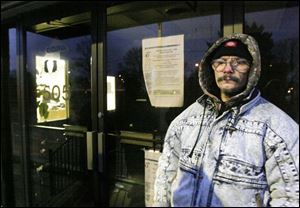 Darrell Cole of East Toledo said the wait outside for energy aid wouldn t be bad if there were some protection from the weather. 