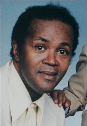 Donald Lee was discovered in his kitchen after the fire crew put out a burning couch.