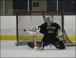Erik Fisher, a junior goaltender, is 12-5-3 with a .940 save percentage for the Cougars. He leads the NHC Red Division with a 2.00 goals-against average.