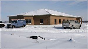 Slug: BIZ build18p                     Date1/15/2009           The Blade/Amy E. Voigt               Location: Bowling Green, Ohio NOTE TO DESK:  There was no one working at site.  CAPTION:  The Social Security administration building in Bowling Green is under construction at the Innovative Technology Park.