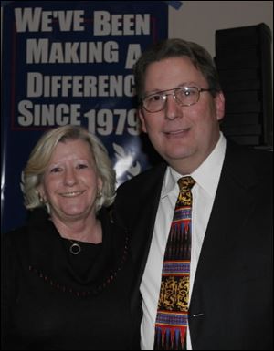 Bonnie and Jim Mossing at the SMB Construction 30th anniversary celebration at Tamaron Country Club.