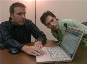 Jonathan Shroyer, left, and Steven Pignataro, founders of CorePHP Web design, received a boost from BC Ventures, the technology development arm of Battle Creek Unlimited.