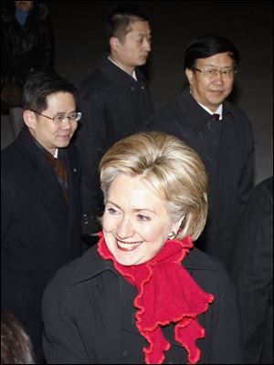 Secretary of State Hillary Clinton arrives in Beijing for three days of talks, although she said her priority no longer includes such contentious issues as Taiwan and freedom for Tibet.