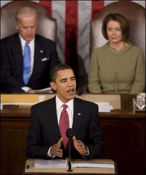 President Obama addresses a joint session of Congress with Vice President Joe Biden and House Speaker Nancy Pelosi (D., Calif.) in the background.