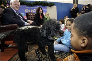 Barack and Michelle Obama are leaning toward getting a Portuguese water dog as the family pet, possibly in April, for daughters Sasha and Malia.
