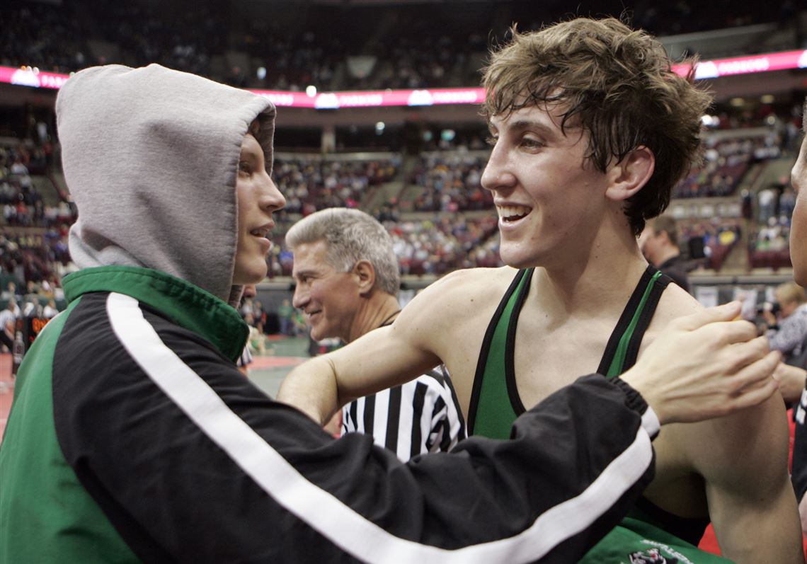 Delta s Jonny Tolson, left, congratulates Reid Rayfield, who beat Kyle Begg of Bluffton.