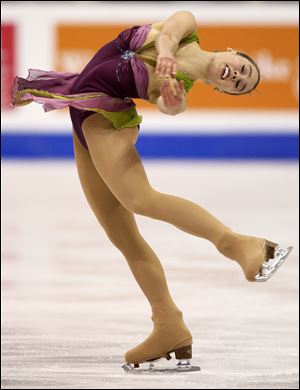 Bowling Green State University student Alissa Czisny skates in
Saturday night s World Figure Skating Championships in Los Angeles.