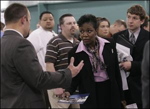 Beverly Barnhill of Toledo already has a job but says she wanted to see what options were available to her. The fair drew people from at least as far as Lima, Ohio, and suburban Detroit.