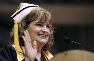 Slug: CTY OWENSGRAD08P B         The Blade/Jeremy Wadsworth  Date: 05/08/09  Caption: Laura Drouard, of Rossford, a registered nursing program graduate speaks during commencement ceremonies Friday, 05/08/09, at Owens Community College.