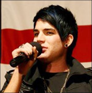 This image provided by the US Marine Corps shows Adam Lambert, one of the three finalists for American Idol and a San Diego native, sings the national anthem,  The Star Spangled Banner  during his visit to Marine Corps Air Station Miramar s Bob Hope Theater, Friday May 8, 2009. He showed his appreciation for the service members and their families and thought it fitting to sing it for them. 

