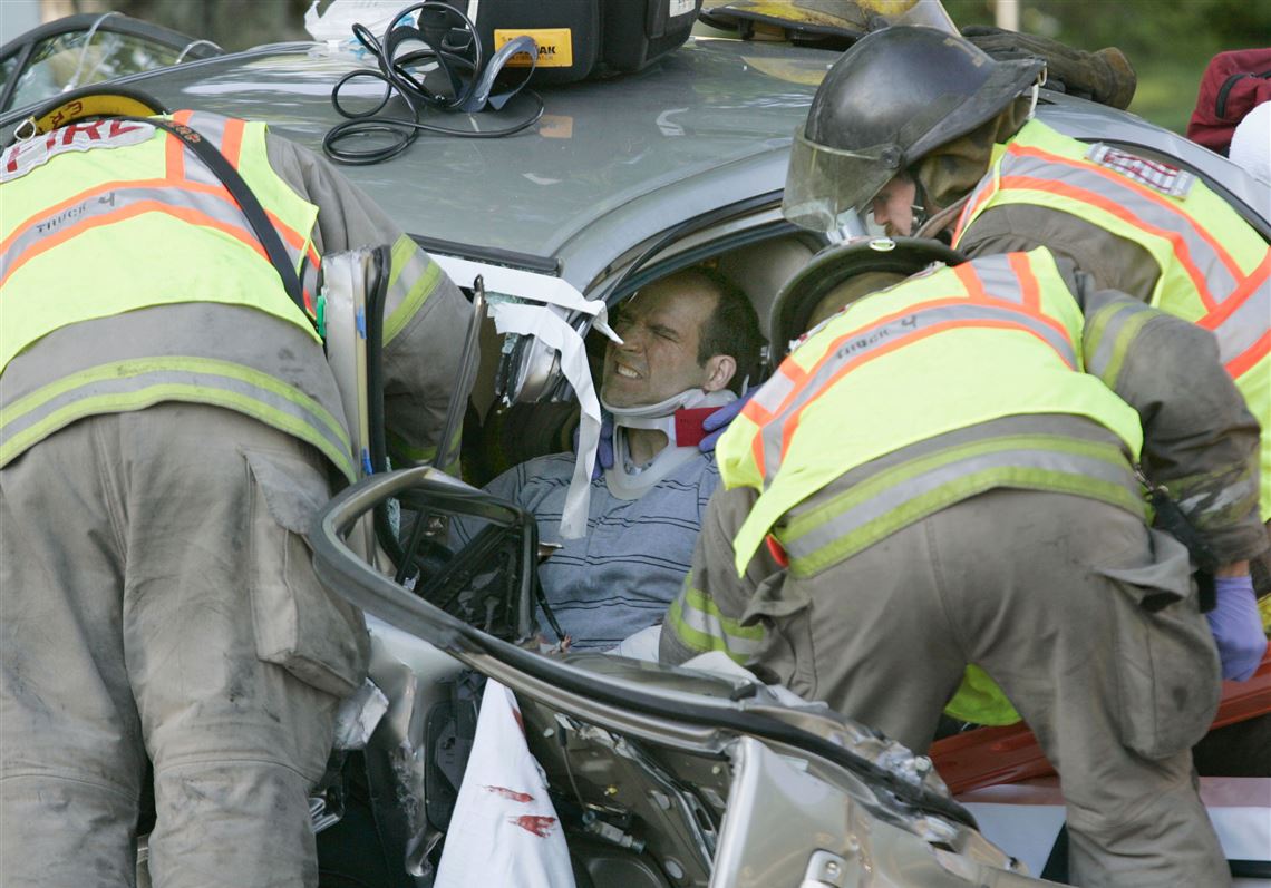 Person hospitalized after car crashes into south Toledo building