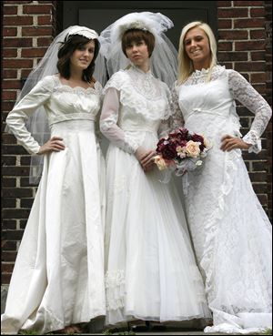 From left: John Casablancas models Lindsay Gehart, Patti Boring, and Emmy Waganfeald will wear old wedding dresses at the Oregon and Jerusalem Township Historical Society style show.