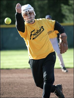 Bob Miller pitches one to the Allshred Services batter.