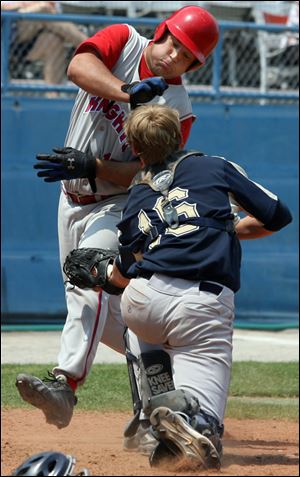 St. Francis  Kyle Wilkes can t avoid the tag of St. John s catcher
Eric Croak (16) in the sixth. Wilkes finished 2-for-3 at the plate.