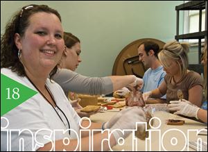 Amy Crofts, standing in the Food For Thought Food Bank, started serving the homeless in May 2007.