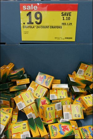 Retailers are offering early-bird shoppers steep discounts on staples such as crayons. 