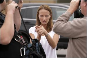 Stacey Falk describes what she saw during the shooting in an exercise class at LA Fitness in Bridge ville, Pa., a Pittsburgh suburb. Three women were killed and nine injured in Tuesday s rampage. 