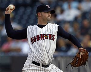 The Hens' Scot Drucker makes a delivery against Columbus. 