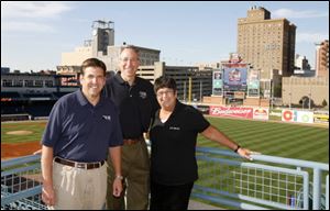 Bill Kitson, left, Richard Hylant, and Kim
Sidwell at the United Way event.