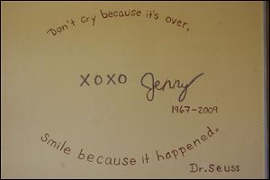 After Jenny Steingass died, Mason High School junior Dominic Goodell painted this sign for the lounge. The renovation was paid for with money left to the school by Mrs. Steingass, who died from melanoma cancer in March at age 42.
