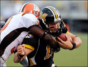Bowling Green' s Roger Williams tackles Missouri quarterback Blaine Gabbert in Saturday night's game.