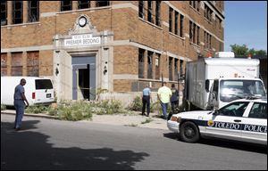 The badly decomposed body of a female was found yesterday in the basement of an abandoned building on Elm Street. Authorities expect to learn today if the body was that of Cindy Sumner.