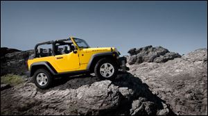 Local dealers are worried Chrysler's transformation of its lineup will mean less advertising for Jeep products.