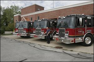 NBRW SYLFIRE30p  The Blade/Lisa Dutton Sept. 24, 2009 Sylvania Twp OH  Get photo of new fire trucks and newly trained firefighters at Syvlania Township FD Station 4.  NOTE TO DESK there were no new firefighters there.