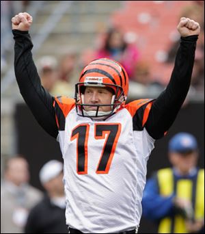 Shayne Graham celebrates after his game-winning kick.