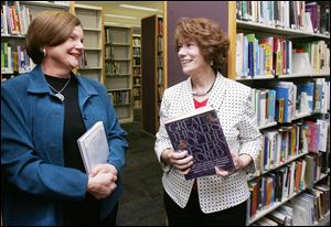 From left: Kathy Lundberg of the Heatherdowns branch and Colleen Lehmann of the Holland branch have plans to retire.