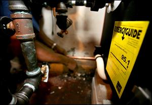 Conservation efforts, such as these high-efficiency heating and cooling units, have played a role in decreasing the demand for natural gas.