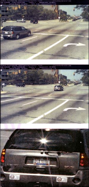 cty CARTY RED LIGHT         Photo from police red light camera   ***   NOT BLADE PHOTO     A GMC station wagon assigned to Toledo Mayor Carty Finkbeiner is shown running a red light at the intersection of Cherry and Summit streets August 25, 2009, at 1:32 p.m.   Mayor Finkbeiner, a strong supporter of red light cameras, has received a total of four such tickets for running the lights.