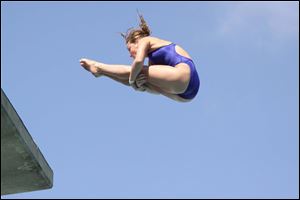 Bedford senior Cheyenne Cousineau competes nationally in the platform event. In high school she is a two-time state champion at 1-meter diving. 