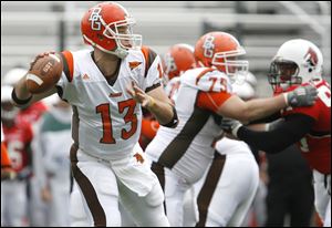BG's Tyler Sheehan looks to fire a pass against Ball State. He completed 28 of 41 for 376 yards.