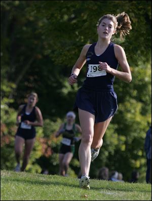 Notre Dame's Lexi Aughenbaugh won the girls individual title and helped the Eagles win the team crown. She finished with a time of 18:44.73 to help Notre Dame win its eighth consecutive team title, breaking the record held by Central Catholic from 1985-1991. 