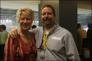 Bridgette and James Kabat have a goal in mind: Party hearty in a suite at the new arena rented for the inaugural Toledo Walleye hockey game.
<BR>
<img src=http://www.toledoblade.com/graphics/icons/photo.gif> <font color=red><b>VIEW</font color=red></b>: <a href=
