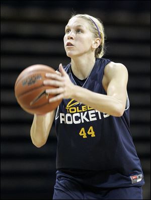 Lisa Johnson, a 6-foot-1 senior, shoots during practice. The Northview graduate averaged 8.2 points last year.