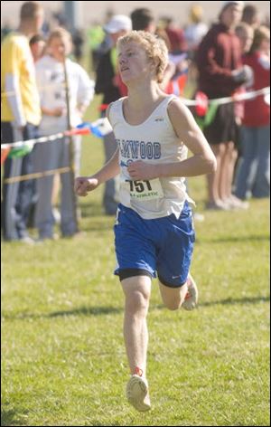 Nick Goebel of Elmwood finishes in seventh-place at the Division III statse meet. He led in the first mile.