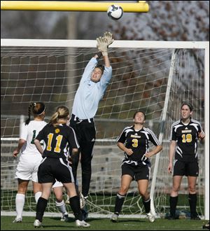 Northview's Jessica Jessing goes high to make a save in a regional final against fourth-ranked Medina. Jessing made several spectacular plays, but it wasn't enough as the Wildcats were stymied on offense. Medina has only lost one time all season and has yet to surrender a tournament goal. Northview finishes 13-6-3. 
<br>
<img src=http://www.toledoblade.com/graphics/icons/photo.gif> <font color=red><b>VIEW</b></font>: <a href=