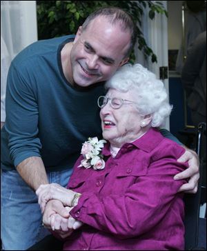 Cardiologist Tom Pappas greets his patient Clara
Weinblatt at the celebration. ‘It's rare to meet someone
so beautiful and alive,' the doctor said.
