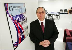 Veterans Assistant Michael Gill-Jacobson, an Army veteran, hopes his experiences will make veterans feel more comfortable coming to him with questions.