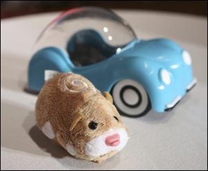 In this Oct. 1, 2009 file photo, Zhu Zhu Pet hamster is shown at the Time to Play Holiday 2009 Most Wanted List event in New York. Zhu Zhu Pet maker Cepia LLC defended its product Saturday, Dec. 5, 2009, against a study by San Francisco-based GoodGuide that said higher-than-allowed levels of the chemical antimony were found in the toy.