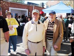 It takes Richard Enk, left, and Gene Roach 15 hours to drive from Toledo to Aiken, S.C.