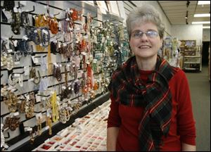Julia Robertson in her shop. Meant to Bead
<br>
<img src=http://www.toledoblade.com/assets/jpg/TO66067417.JPG> <b><font color=red>VIEW: </b></font color=red> <a href=
