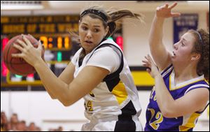 Northview's Olivia Fouty goes against St. Ursula's Cassie Jones. Fouty has signed to play at Eastern Michigan.