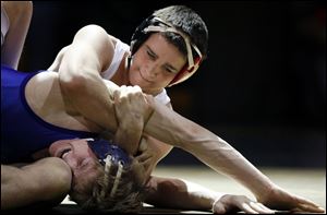 Oak Harbor's Alex Bergman posted a 1-0 victory over Garrett Manley in the 130-pound title
match.
