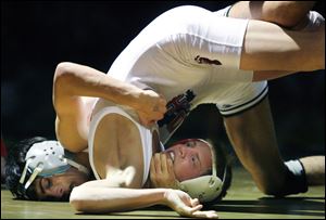 Teammate Tyler Hackworth controlled Athony Elchert in his final.
