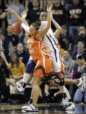 Toledo's Tanika Mays is fouled by Bowling Green's Tara Breske during the second half.