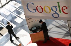 Google logo is displayed at the National Retail Federation convention in New York. Google on Wednesday, Feb. 10, 2010 said it plans to build experimental, ultra-fast Internet networks in a handful of communities around the country.