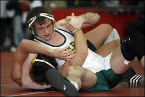Start's Nate Brubaker pins Collin Cummerow of Clay in the 171-pound final at the City League Championship. Brubaker was chosen as the tournament's outstanding wrestler.